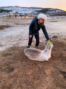 Rachel feeding a reindeer