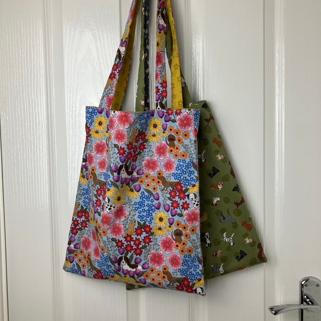 Two dog print fabric tote bags
